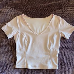 Lululemon light pink cropped tight short sleeve